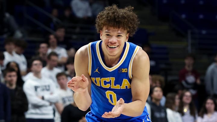Jan 14, 2026; University Park, Pennsylvania, USA; UCLA Bruins guard Trent Perry (0) reacts after scoring a basket during the second half against the Penn State Nittany Lions at Bryce Jordan Center. Mandatory Credit: Matthew O'Haren-Imagn Images
