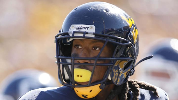 October 8, 2011; Morgantown,WV, USA: West Virginia Mountaineers defensive end Bruce Irvin (11) on the field against the Connecticut Huskies during the third quarter at Milan Puskar Stadium. WVU won 43-16. Mandatory Credit: Charles LeClaire-USPRESSWIRE