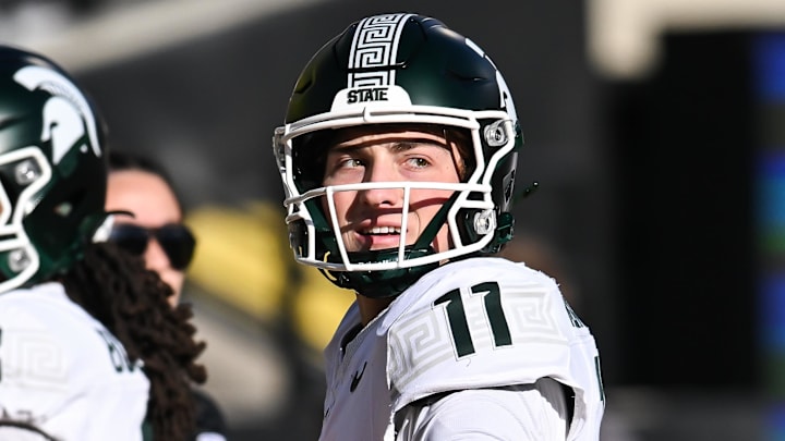Nov 22, 2025; Iowa City, Iowa, USA; Michigan State Spartans quarterback Alessio Milivojevic (11) warms up before the game against the Iowa Hawkeyes at Kinnick Stadium. Mandatory Credit: Jeffrey Becker-Imagn Images