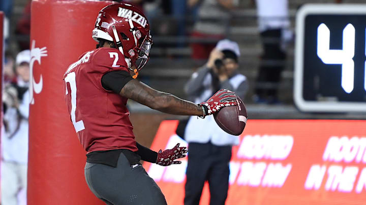 Sep 20, 2024; Pullman, Washington, USA; Washington State Cougars wide receiver Kyle Williams (2) celebrates a touchdown in the second half against the San Jose State Spartans at Gesa Field at Martin Stadium. Washington State Cougars won 54-52 in double overtime. 