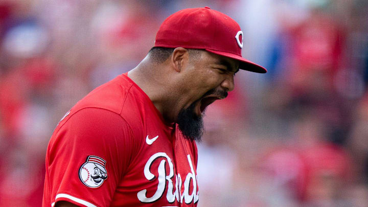 Cincinnati Reds pitcher Tony Santillan (64) reacts