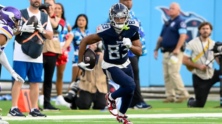 Nov 17, 2024; Nashville, Tennessee, USA; Tennessee Titans wide receiver Tyler Boyd (83) runs with the ball after a made catch against the Minnesota Vikings during the second half at Nissan Stadium. Mandatory Credit: Steve Roberts-Imagn Images Nov 17, 2024; Nashville, Tennessee, USA; Tennessee Titans wide receiver Tyler Boyd (83) runs with the ball after a made catch against the Minnesota Vikings during the second half at Nissan Stadium. Mandatory Credit: Steve Roberts-Imagn Images