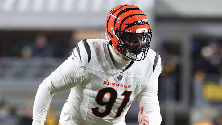 Jan 4, 2025; Pittsburgh, Pennsylvania, USA;  Cincinnati Bengals defensive end Trey Hendrickson (91) pass rushes at the line of scrimmage against the Pittsburgh Steelers during the second quarter at Acrisure Stadium. Mandatory Credit: Charles LeClaire-Imagn Images