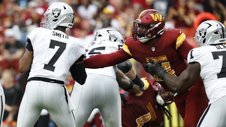 Washington Commanders outside linebacker Von Miller and former Las Vegas Raiders quarterback Geno Smith.