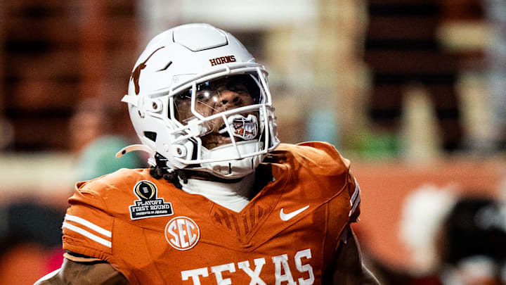 Texas Longhorns running back Jaydon Blue (23) smiles in the end zone after running the ball in for a touchdown in the fourth quarter as the Texas Longhorns play the Clemson Tigers in the first round of the College Football Playoffs at Darrell K Royal Texas Memorial Stadium in Austin, Texas, Dec. 21, 2024. Texas Longhorns running back Jaydon Blue (23) smiles in the end zone after running the ball in for a touchdown in the fourth quarter as the Texas Longhorns play the Clemson Tigers in the first round of the College Football Playoffs at Darrell K Royal Texas Memorial Stadium in Austin, Texas, Dec. 21, 2024.