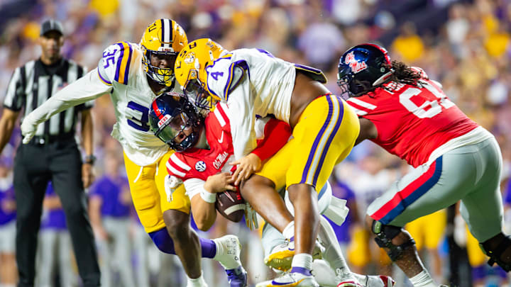 Brayden Swensen 4 sacks quarterback Jaxson Dart 2 as the LSU Tigers take on the Ole Miss Rebels at Tiger Stadium in Baton Rouge, LA. Saturday, Oct. 12, 2024.