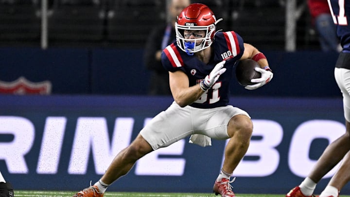 Jan 30, 2025; Arlington, TX, USA; East wide receiver Efton Chism of Eastern Washington (81) runs with the ball during the first half against the West at AT&T Stadium. Mandatory Credit: Jerome Miron-Imagn Images Jan 30, 2025; Arlington, TX, USA; East wide receiver Efton Chism of Eastern Washington (81) runs with the ball during the first half against the West at AT&T Stadium. Mandatory Credit: Jerome Miron-Imagn Images