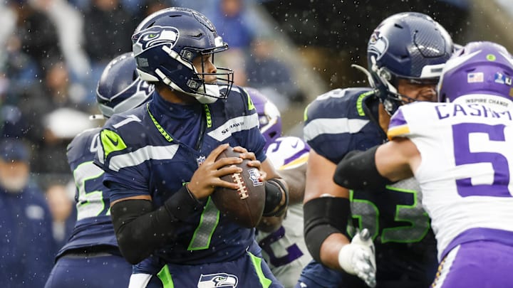 Dec 22, 2024; Seattle, Washington, USA; Seattle Seahawks quarterback Geno Smith (7) looks to pass against the Minnesota Vikings during the first quarter at Lumen Field. Mandatory Credit: Joe Nicholson-Imagn Images Dec 22, 2024; Seattle, Washington, USA; Seattle Seahawks quarterback Geno Smith (7) looks to pass against the Minnesota Vikings during the first quarter at Lumen Field. Mandatory Credit: Joe Nicholson-Imagn Images