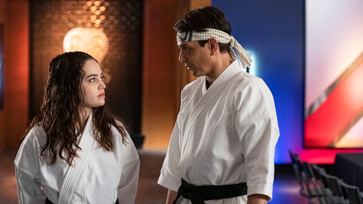 Cobra Kai. (L to R) Mary Mouser as Samantha LaRusso, Ralph Macchio as Daniel LaRusso in episode 508 of Cobra Kai. Cr. Curtis Bonds Baker/Netflix © 2022