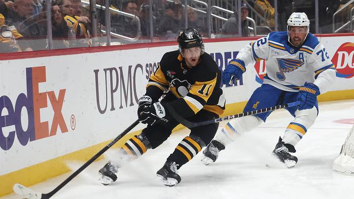 Oct 27, 2025; Pittsburgh, Pennsylvania, USA; Pittsburgh Penguins center Filip Hallander (11) moves the puck ahead of St. Louis Blues defenseman Justin Faulk (72) during the third period at PPG Paints Arena. Mandatory Credit: Charles LeClaire-Imagn Images Oct 27, 2025; Pittsburgh, Pennsylvania, USA; Pittsburgh Penguins center Filip Hallander (11) moves the puck ahead of St. Louis Blues defenseman Justin Faulk (72) during the third period at PPG Paints Arena. Mandatory Credit: Charles LeClaire-Imagn Images