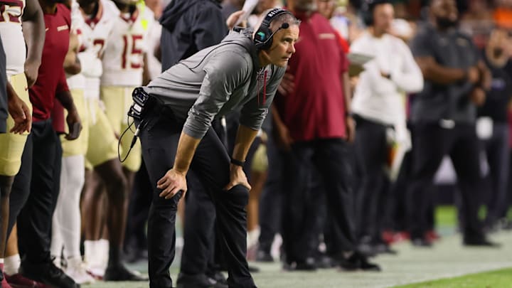 Oct 26, 2024; Miami Gardens, Florida, USA; Florida State Seminoles head coach Mike Norvell watches from the sideline against the Miami Hurricanes during the second quarter at Hard Rock Stadium. Mandatory Credit: Sam Navarro-Imagn Images