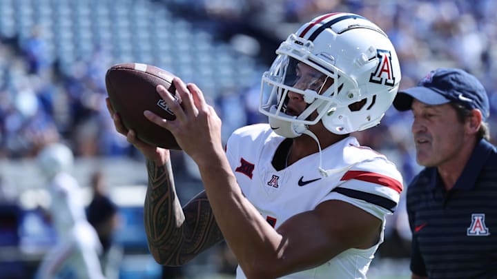 Arizona Wildcats wide receiver Tetairoa McMillan warms up before the game against the Brigham Young Cougars.