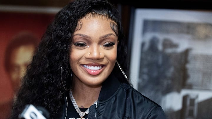 Rapper GloRilla smiles during a press conference to present a check for $25,000 to Melrose High School, where she graduated from in 2017, in the school’s library in Memphis, Tenn., on Wednesday, December 18, 2024. Rapper GloRilla smiles during a press conference to present a check for $25,000 to Melrose High School, where she graduated from in 2017, in the school’s library in Memphis, Tenn., on Wednesday, December 18, 2024.