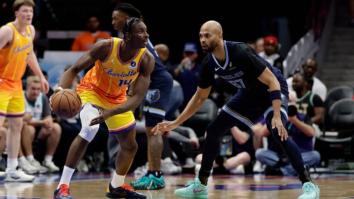 Mar 21, 2026; Charlotte, North Carolina, USA; Charlotte Hornets forward Moussa Diabaté (14) is guarded by Memphis Grizzlies forward Taj Gibson (67) during the second quarter at Spectrum Center. Mandatory Credit: Brian Westerholt-Imagn Images Mar 21, 2026; Charlotte, North Carolina, USA; Charlotte Hornets forward Moussa Diabaté (14) is guarded by Memphis Grizzlies forward Taj Gibson (67) during the second quarter at Spectrum Center. Mandatory Credit: Brian Westerholt-Imagn Images