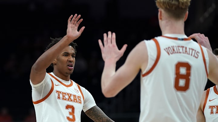 Texas Longhorns guard Dailyn Swain is congratulated by center Matas Vokietaitis during the first half against the Southern University Jaguars at Moody Center. Texas Longhorns guard Dailyn Swain is congratulated by center Matas Vokietaitis during the first half against the Southern University Jaguars at Moody Center.