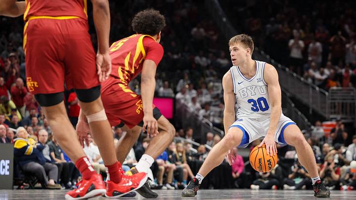 Mar 13, 2025; Kansas City, MO, USA; Brigham Young Cougars guard Dallin Hall (30) brings the ball up court around Iowa State Cyclones guard Curtis Jones (5) during the first half at T-Mobile Center. Mandatory Credit: William Purnell-Imagn Images Mar 13, 2025; Kansas City, MO, USA; Brigham Young Cougars guard Dallin Hall (30) brings the ball up court around Iowa State Cyclones guard Curtis Jones (5) during the first half at T-Mobile Center. Mandatory Credit: William Purnell-Imagn Images
