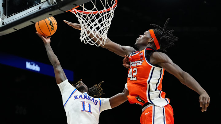 Nov 25, 2025; Las Vegas, Nevada, USA; Kansas Jayhawks guard Jamari McDowell (11) shoots the ball defended by Syracuse Orange forward William Kyle III (42) during the first half in a 2025 Players Era Festival group play game at MGM Grand Garden Arena. Mandatory Credit: Stephen R. Sylvanie-Imagn Images