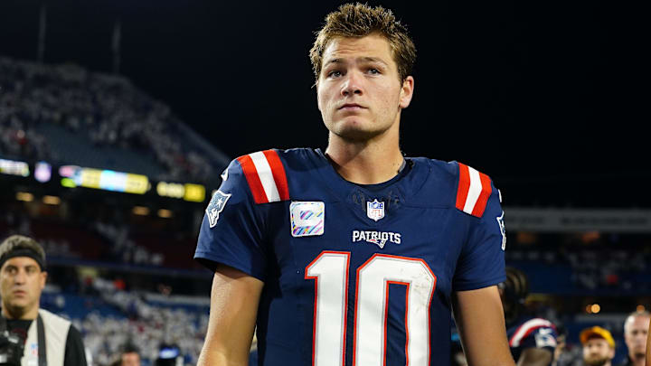 New England Patriots quarterback Drake Maye (10) walks off the field against the Buffalo Bills after the game at Highmark Stadium.