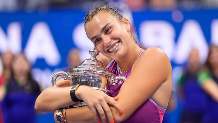 Sept 7, 2024; Flushing, NY, USA Aryna Sabalenka with the US Open Trophy after beating Jessica Pegula (USA) in the women's singles final on day thirteen of the 2024 U.S. Open tennis tournament at USTA Billie Jean King National Tennis Center. Mandatory Credit: Robert Deutsch-Imagn Images