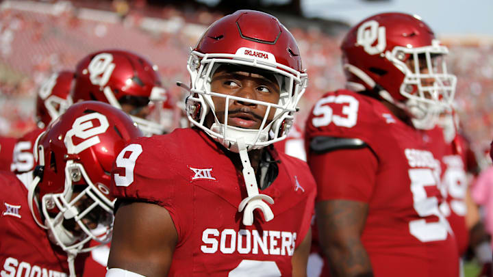 Oklahoma's Gentry Williams (9) warms up before the college football game between Oklahoma  and UCF at Gaylord Family — Oklahoma Memorial Stadium in Norman, Okla., on Saturday, Oct., 21, 2023.