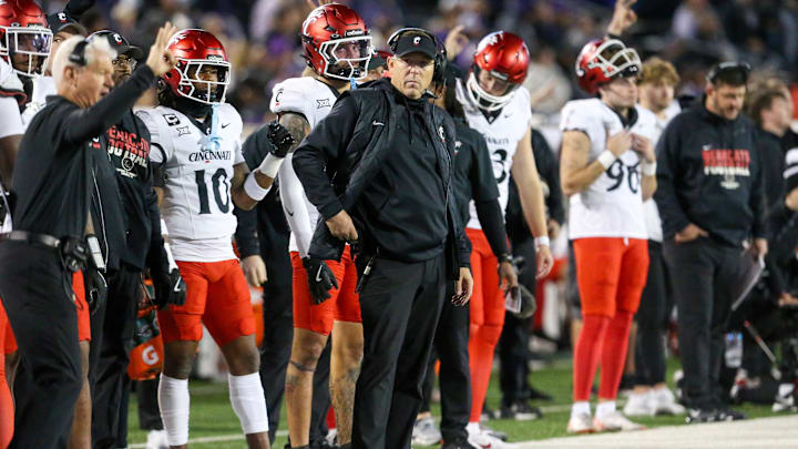 Nov 23, 2024; Manhattan, Kansas, USA; Cincinnati Bearcats head coach Scott Satterfield looks on during the fourth quarter against the Kansas State Wildcats at Bill Snyder Family Football Stadium. Mandatory Credit: Scott Sewell-Imagn Images