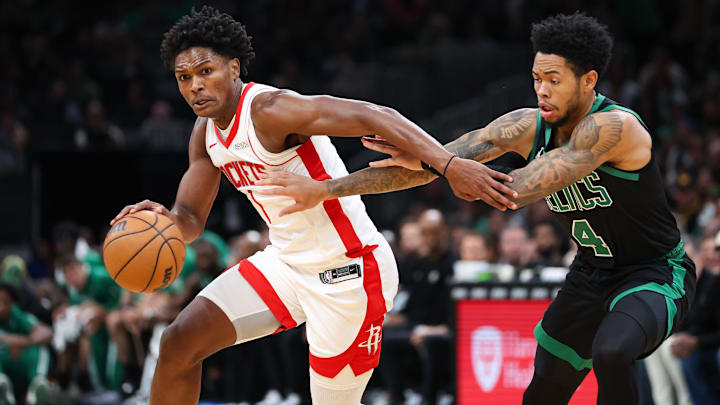 Nov 1, 2025; Boston, Massachusetts, USA; Houston Rockets forward Amen Thompson (1) drives to the basket during the first half against the Boston Celtics at TD Garden. Mandatory Credit: Paul Rutherford-Imagn Images