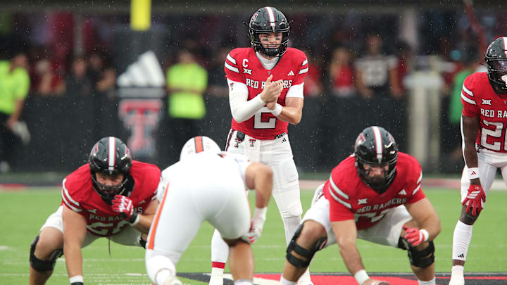 Sep 13, 2025; Lubbock, Texas, USA;  Texas Tech Red Raiders quarterback Behren Morton (2) waits for the snap against the Oregon State Beavers in the first half at Jones AT&T Stadium. Mandatory Credit: Michael C. Johnson-Imagn Images