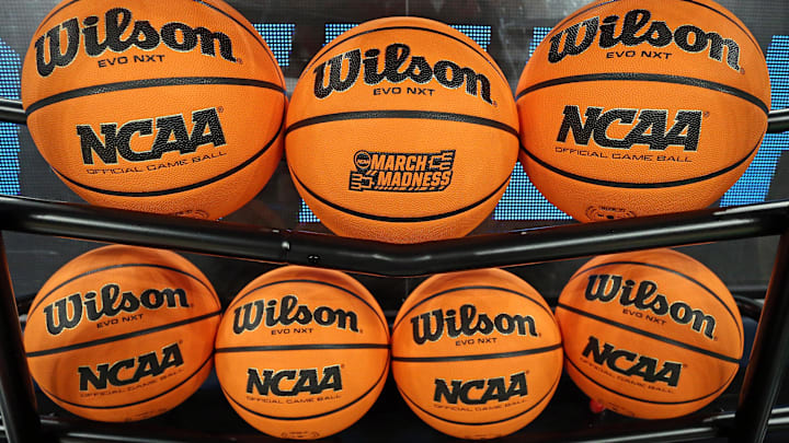 NCAA March Madness and Wilson Logos on a basketball NCAA March Madness and Wilson Logos on a basketball