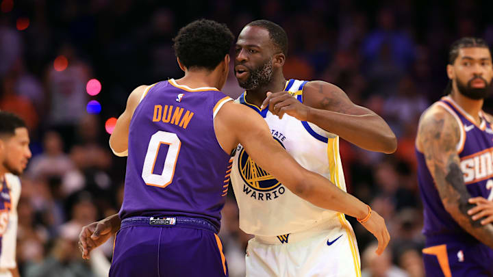 Apr 8, 2025; Phoenix, Arizona, USA; Golden State Warriors forward Draymond Green (23) greets Phoenix Suns forward Ryan Dunn (0) at Footprint Center. Mandatory Credit: Mark J. Rebilas-Imagn Images Apr 8, 2025; Phoenix, Arizona, USA; Golden State Warriors forward Draymond Green (23) greets Phoenix Suns forward Ryan Dunn (0) at Footprint Center. Mandatory Credit: Mark J. Rebilas-Imagn Images