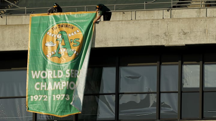 May 31, 2014; Oakland, CA, USA; The Oakland Athletics unveiled a new banner honoring the 1972, 1973 and 1974 World Series Championship teams prior to the game against the Los Angeles Angels at O.co Coliseum. Mandatory Credit: Cary Edmondson-Imagn Images