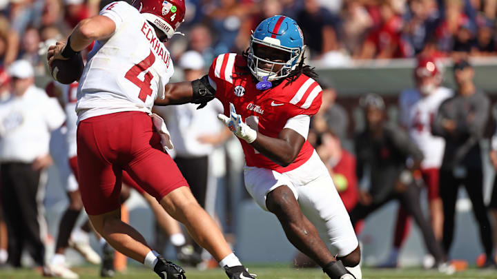 Oct 11, 2025; Oxford, Mississippi, USA; Mississippi Rebels linebacker Princewill Umanmielen (1) sacks Washington State Cougars quarterback Zevi Eckhaus (4) during the fourth quarter at Vaught-Hemingway Stadium. Mandatory Credit: Petre Thomas-Imagn Images