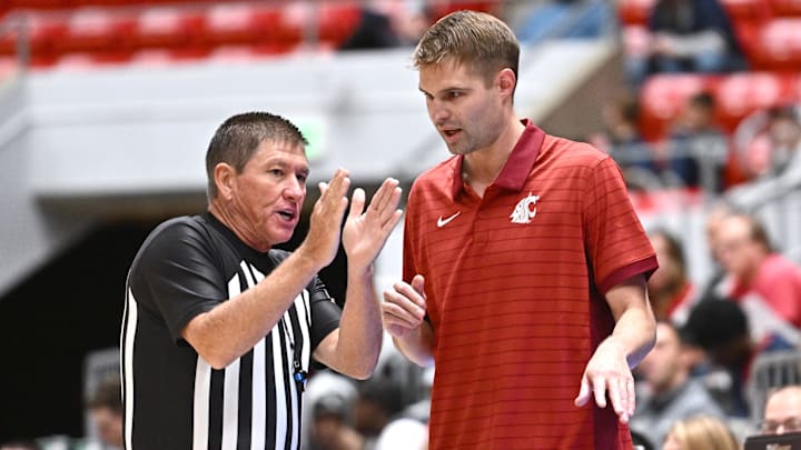 Oct 25, 2025; Pullman, WA, USA; Washington State Cougars head coach David Riley talks with an official during a game against the New Mexico Lobos in the second half at Friel Court at Beasley Coliseum. Mandatory Credit: James Snook-Imagn Images