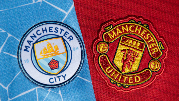 The Manchester City and Manchester United Badges
