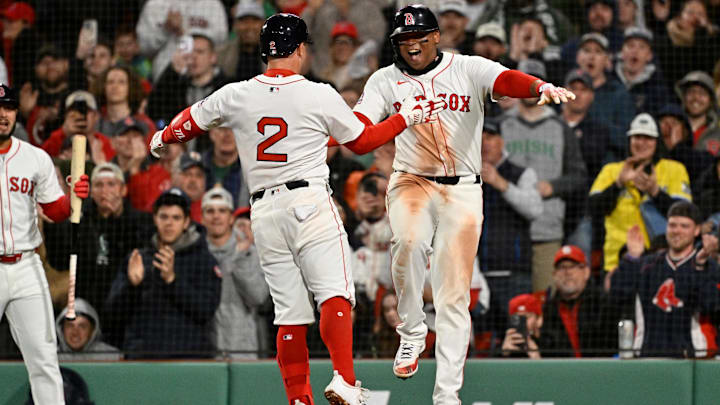 Apr 6, 2025; Boston, Massachusetts, USA; Boston Red Sox third baseman Alex Bregman (2) celebrates a three run home run against the St. Louis Cardinals with designated hitter Rafael Devers (11) during the third inning at Fenway Park. Mandatory Credit: Eric Canha-Imagn Images