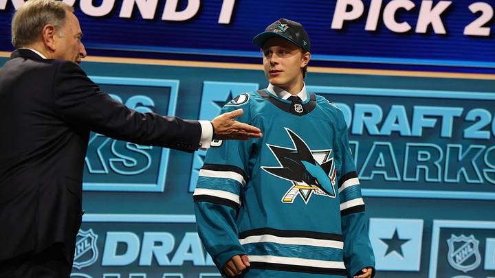 Jun 26, 2026; Buffalo, New York, USA; Ivar Stenberg reacts beside NHL commissioner Gary Bettman after being selected with the second pick in the first round of the 2026 NHL Draft by the San Jose Sharks at KeyBank Center. Mandatory Credit: Timothy T. Ludwig-Imagn Images