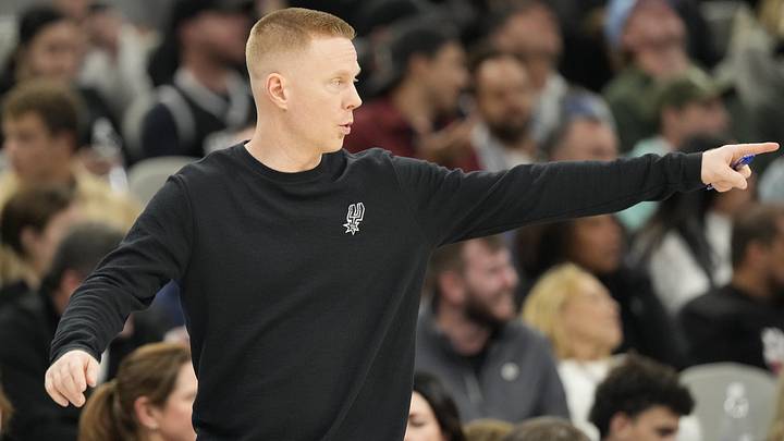 Dec 2, 2025; San Antonio, Texas, USA; San Antonio Spurs assistant head coach Sean Sweeney signals to players during the second half against the Memphis Grizzlies at Frost Bank Center. Mandatory Credit: Scott Wachter-Imagn Images