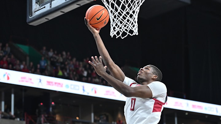Nov 21, 2024; Spokane, Washington, USA; Washington State Cougars guard Cedric Coward (0) makes an easy lay up against the Eastern Washington Eagles in the first half at Spokane Veterans Memorial Arena. Nov 21, 2024; Spokane, Washington, USA; Washington State Cougars guard Cedric Coward (0) makes an easy lay up against the Eastern Washington Eagles in the first half at Spokane Veterans Memorial Arena.