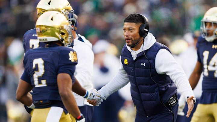 Notre Dame head coach Marcus Freeman celebrates after a touchdown in the first half of a NCAA football game against Syracuse at Notre Dame Stadium on Saturday, Nov. 22, 2025, in South Bend.