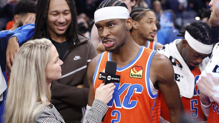 Dec 10, 2024; Oklahoma City, Oklahoma, USA; Oklahoma City Thunder guard Shai Gilgeous-Alexander (2) speaks to a tv reporter after his team defeated the Dallas Mavericks at Paycom Center. Mandatory Credit: Alonzo Adams-Imagn Images