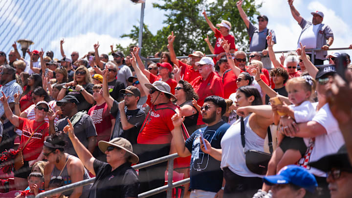 Texas Tech fans cheer during a welcome back event for the Red Raider softball team at Rocky Johnson Field in Lubbock, Texas, on Friday, June 7, 2025.