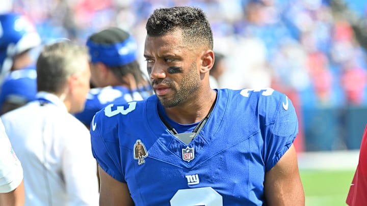 Aug 9, 2025; Orchard Park, New York, USA; New York Giants quarterback Russell Wilson (3) on the sidelines in the third quarter game against the Buffalo Bills at Highmark Stadium. Mandatory Credit: Mark Konezny-Imagn Images