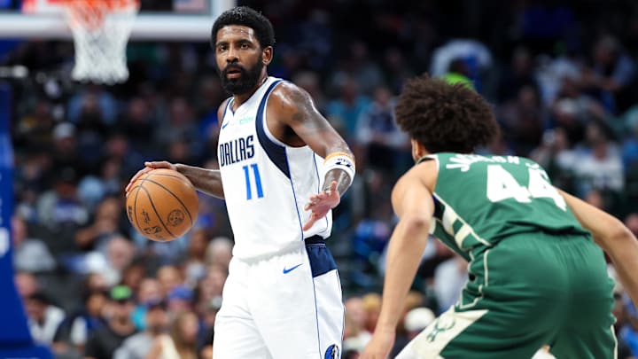 Oct 17, 2024; Dallas, Texas, USA; Dallas Mavericks guard Kyrie Irving (11) dribbles as Milwaukee Bucks guard Andre Jackson Jr. (44) defends during the first half at American Airlines Center. Mandatory Credit: Kevin Jairaj-Imagn Images Oct 17, 2024; Dallas, Texas, USA; Dallas Mavericks guard Kyrie Irving (11) dribbles as Milwaukee Bucks guard Andre Jackson Jr. (44) defends during the first half at American Airlines Center. Mandatory Credit: Kevin Jairaj-Imagn Images