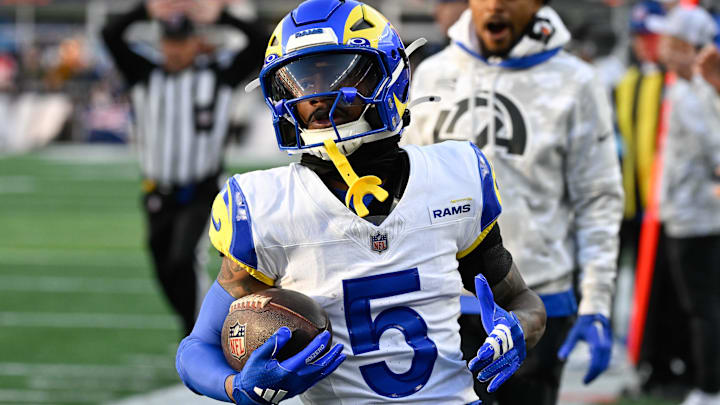 Nov 17, 2024; Foxborough, Massachusetts, USA; Los Angeles Rams wide receiver Tutu Atwell (5) runs out of bounds after making a catch during the second half against the New England Patriots at Gillette Stadium. Mandatory Credit: Eric Canha-Imagn Images