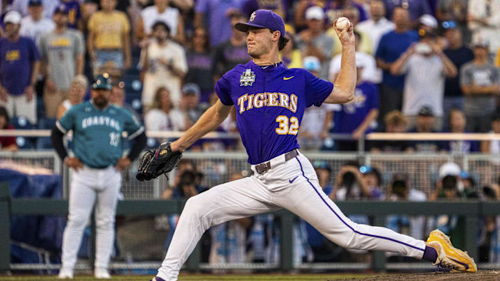 Jun 21, 2025; Omaha, Neb, USA; LSU Tigers starting pitcher Kade Anderson (32) pitches against the Coastal Carolina Chanticleers during the ninth inning at Charles Schwab Field. Mandatory Credit: Dylan Widger-Imagn Images