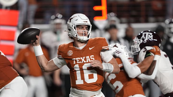 Nov 28, 2025; Austin, Texas, USA; Texas Longhorns quarterback Arch Manning throws a pass during the first half against the Texas A&M Aggies at Darrell K Royal-Texas Memorial Stadium. Mandatory Credit: Scott Wachter-Imagn Images
