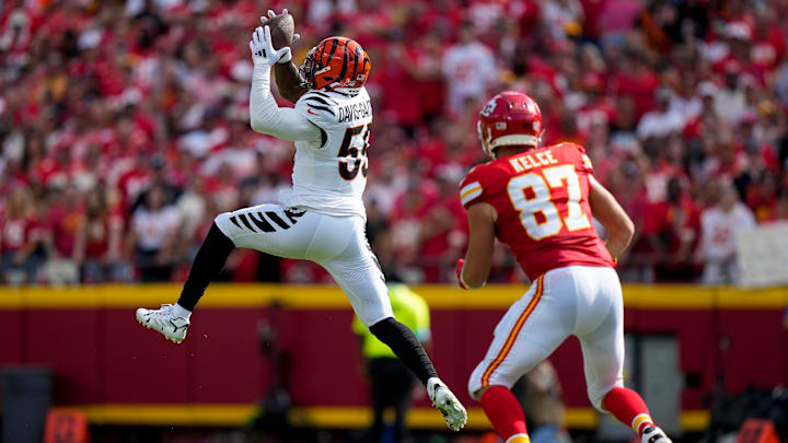 Cincinnati Bengals linebacker Akeem Davis-Gaither (59) intercepts a pass intended for Kansas City Chiefs tight end Travis Kelce (87) in the first quarter of the NFL Week 2 game between the Kansas City Chiefs and the Cincinnati Bengals at Arrowhead Stadium in Kansas City on Sunday, Sept. 15, 2024. The Bengals led 16-10 at halftime. Cincinnati Bengals linebacker Akeem Davis-Gaither (59) intercepts a pass intended for Kansas City Chiefs tight end Travis Kelce (87) in the first quarter of the NFL Week 2 game between the Kansas City Chiefs and the Cincinnati Bengals at Arrowhead Stadium in Kansas City on Sunday, Sept. 15, 2024. The Bengals led 16-10 at halftime.