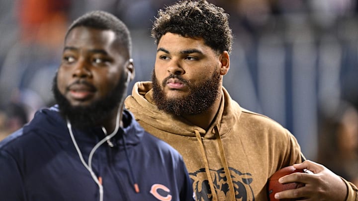 Nov 9, 2023; Chicago, Illinois, USA;  Chicago Bears offensive lineman Darnell Wright (58) warms up on the field before a game against the Carolina Panthers at Soldier Field. Mandatory Credit: Jamie Sabau-Imagn Images
