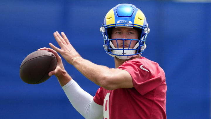 Jun 3, 2025; Woodland Hills, CA, USA; Los Angeles Rams quarterback Matthew Stafford (9) throws the ball during organized team activities at Rams Practice Facility. Mandatory Credit: Kirby Lee-Imagn Images