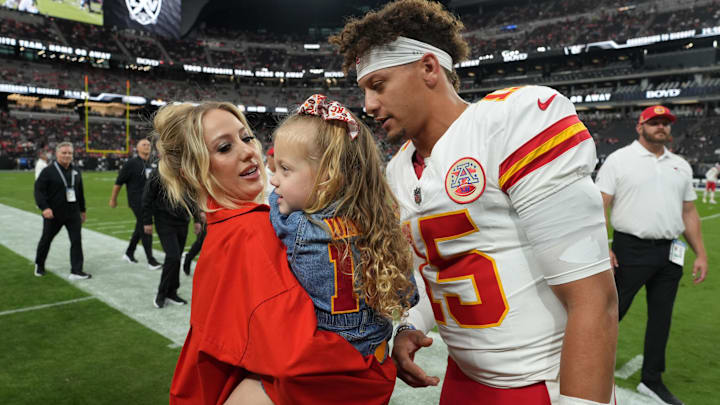 Kansas City Chiefs quarterback Patrick Mahomes (15) interacts with wife Brittany Mahomes and daughter Sterling Mahomes during the game against the Las Vegas Raiders at Allegiant Stadium. Kansas City Chiefs quarterback Patrick Mahomes (15) interacts with wife Brittany Mahomes and daughter Sterling Mahomes during the game against the Las Vegas Raiders at Allegiant Stadium.