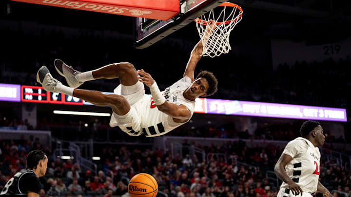 Cincinnati Bearcats forward Baba Miller (18) dunks in the second half of the NCAA basketball game against the Georgia State Panthers at Fifth Third Arena in Cincinnati on Nov. 7, 2025.